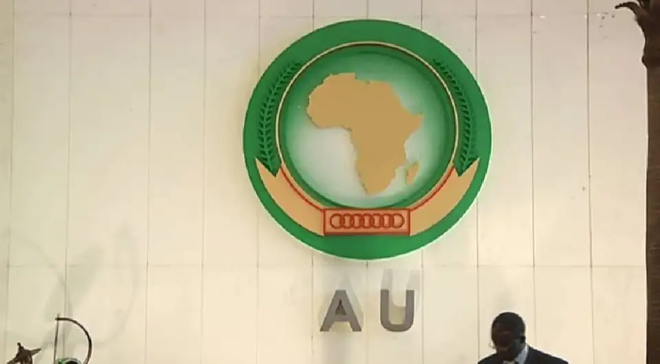 AU